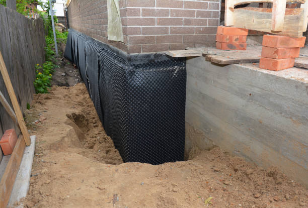 SJ Waterproofing Pros technician performing targeted Foundation Crack Repair assessment in Glenford, OH